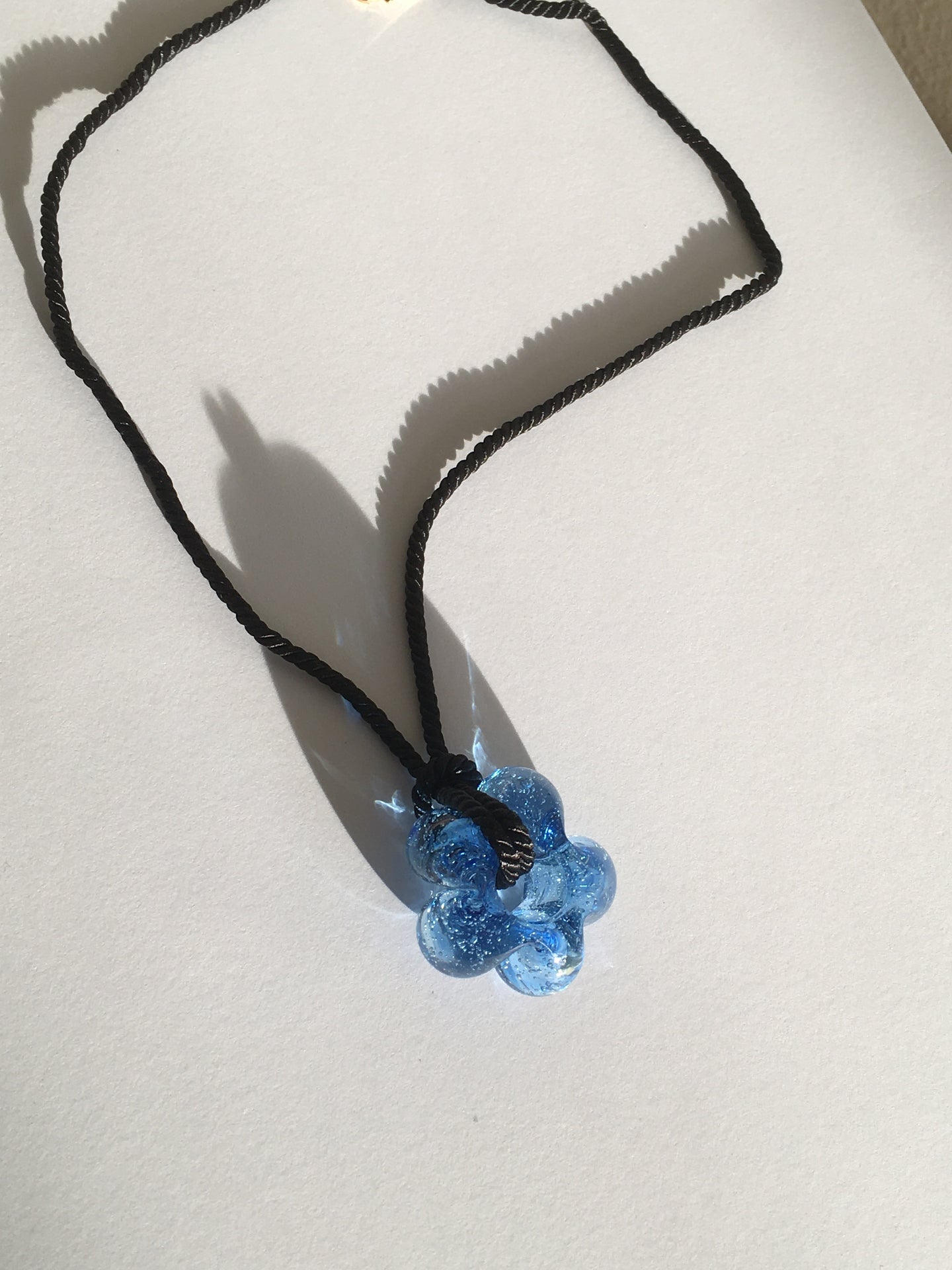 Fleur necklace Blue / Black cord