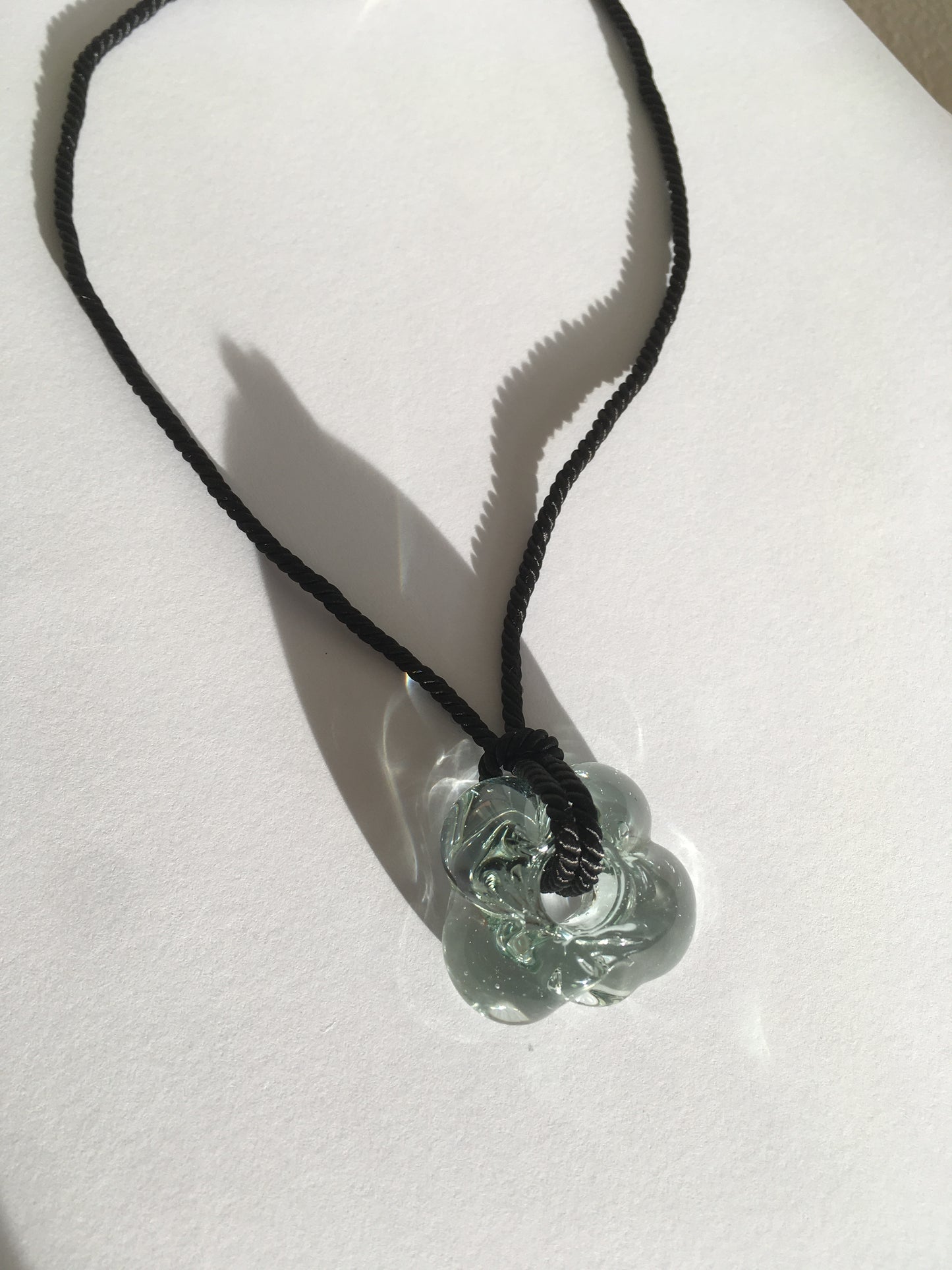 Fleur necklace Clear / Black cord