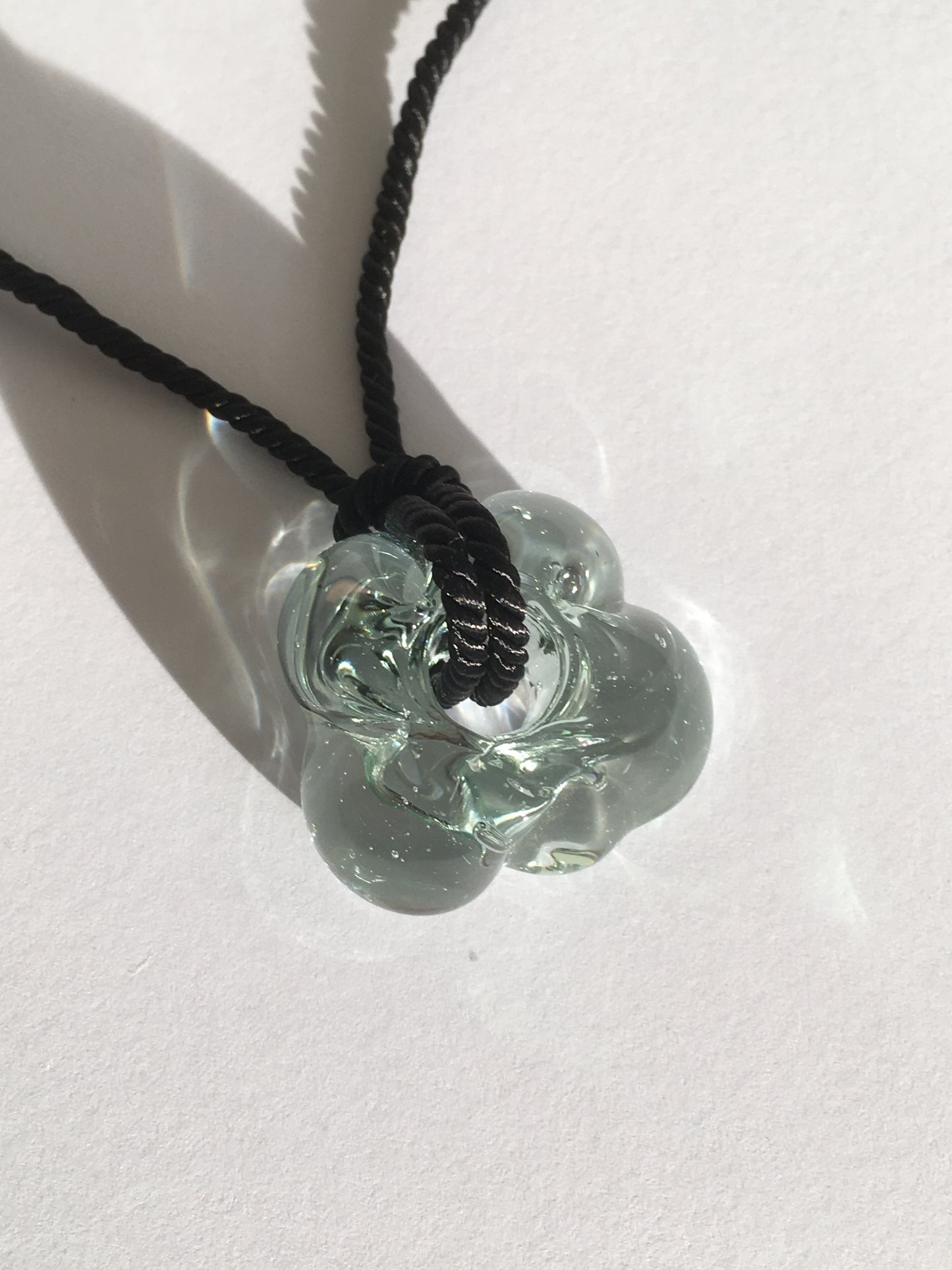 Fleur necklace Clear / Black cord