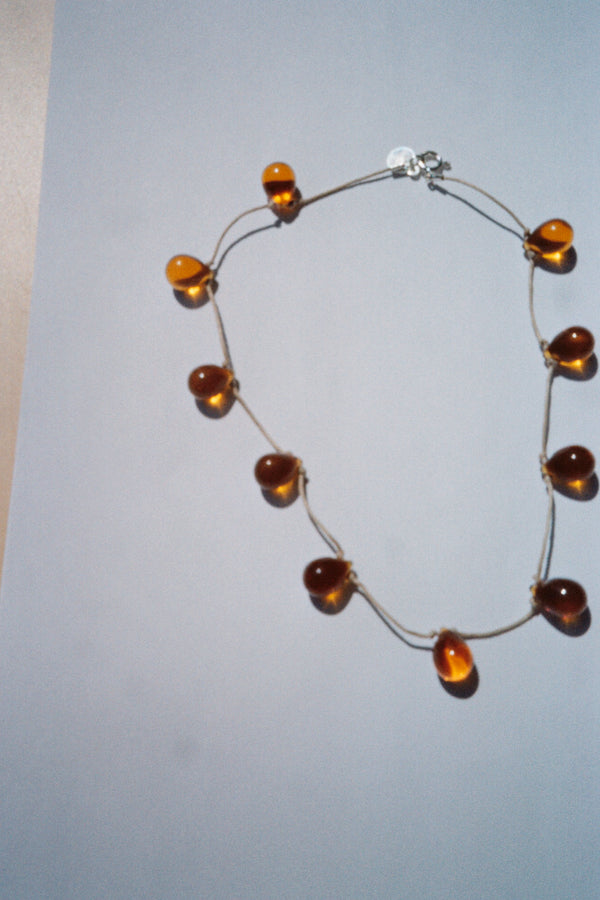 Noué necklace - Amber / Beige cord.